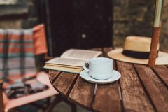 Bank Close House care home Chesterfield - Reading with a cup of tea